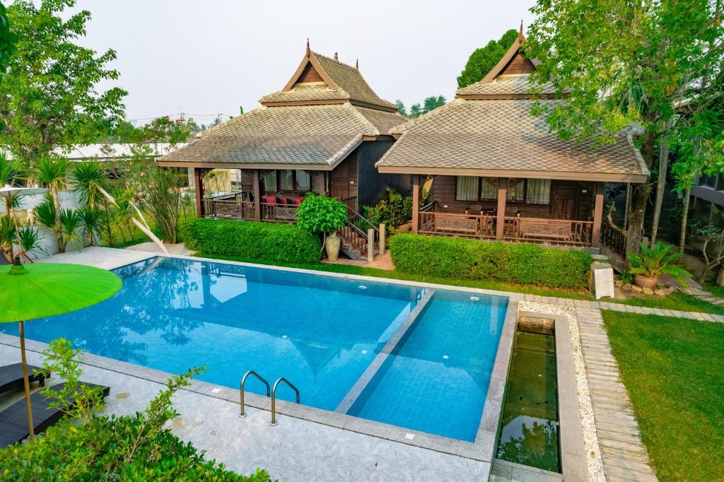 มนต์เมืองเชียงใหม่ รีสอร์ต Monmuang Chiangmai Resort มนต์เมืองเชียงใหม่ รีสอร์ต Monmuang Chiangmai Resort